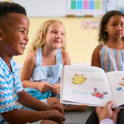 female-primary-or-elementary-school-teacher-reads-2024-10-19-16-46-35-utc